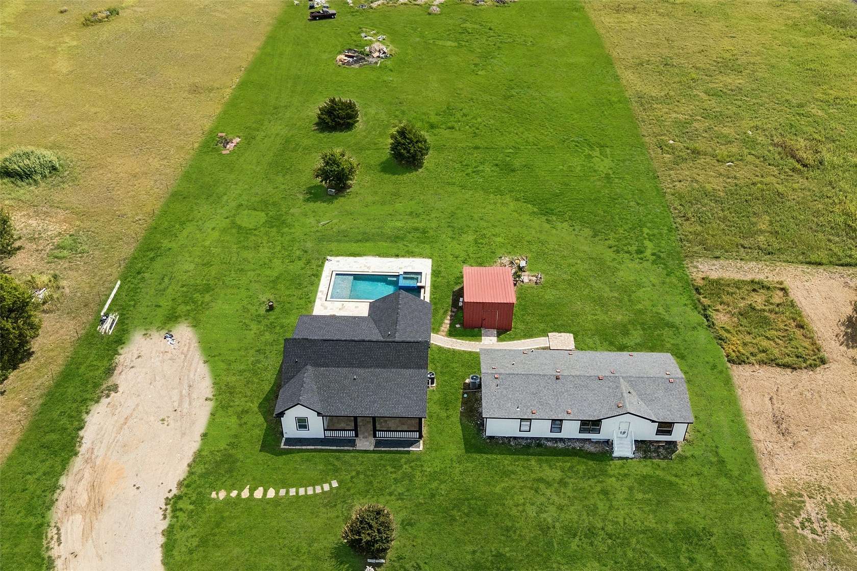 2.5 Acres of Land with Home for Sale in Farmersville, Texas