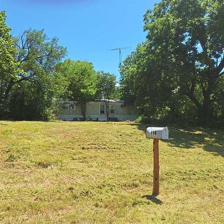 1.5 Acres of Residential Land with Home for Sale in Ravenna, Texas