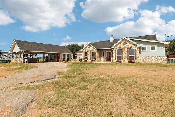 22.4 Acres of Agricultural Land with Home for Sale in Floresville, Texas