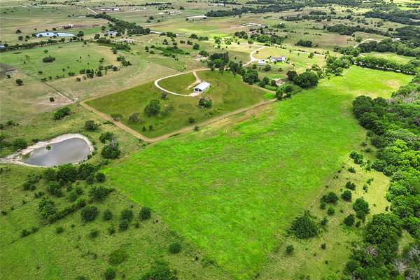 26.6 Acres of Recreational Land with Home for Sale in Decatur, Texas
