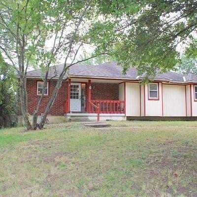 5.25 Acres of Residential Land with Home for Auction in Peculiar, Missouri