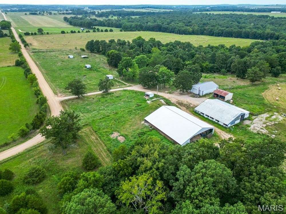 170 Acres of Land with Home for Sale in Lebanon, Missouri