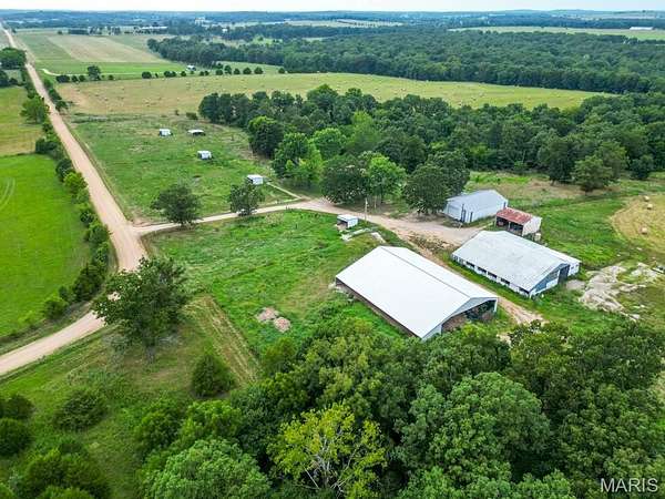 170 Acres of Land with Home for Sale in Lebanon, Missouri