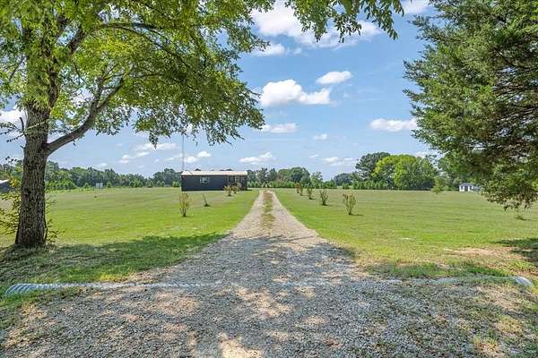 4.5 Acres of Residential Land with Home for Sale in Grand Saline, Texas