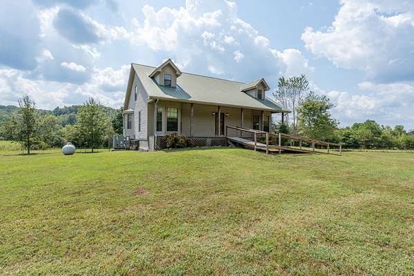11.5 Acres of Land with Home for Sale in Collinwood, Tennessee