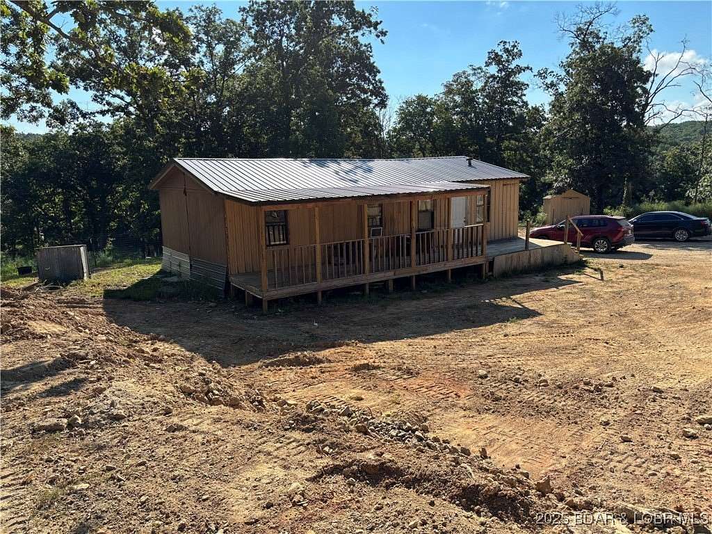 21.8 Acres of Land with Home for Sale in Stover, Missouri