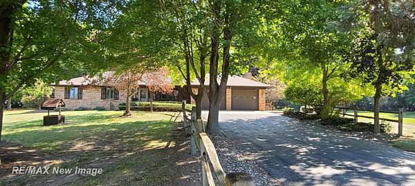 4.66 Acres of Residential Land with Home for Sale in Oakley, Michigan