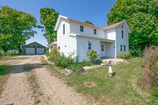 3.33 Acres of Residential Land with Home for Sale in Jones, Michigan