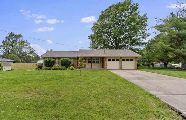 14.7 Acres of Land with Home for Sale in Springfield, Missouri