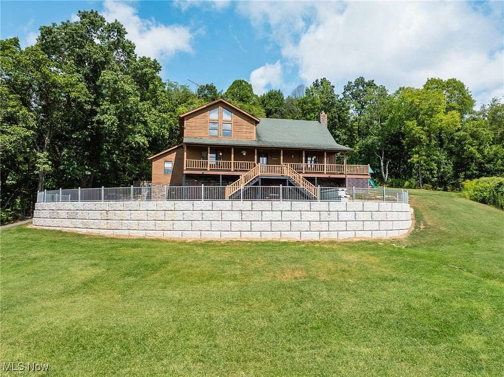 12.1 Acres of Land with Home for Auction in Coshocton, Ohio