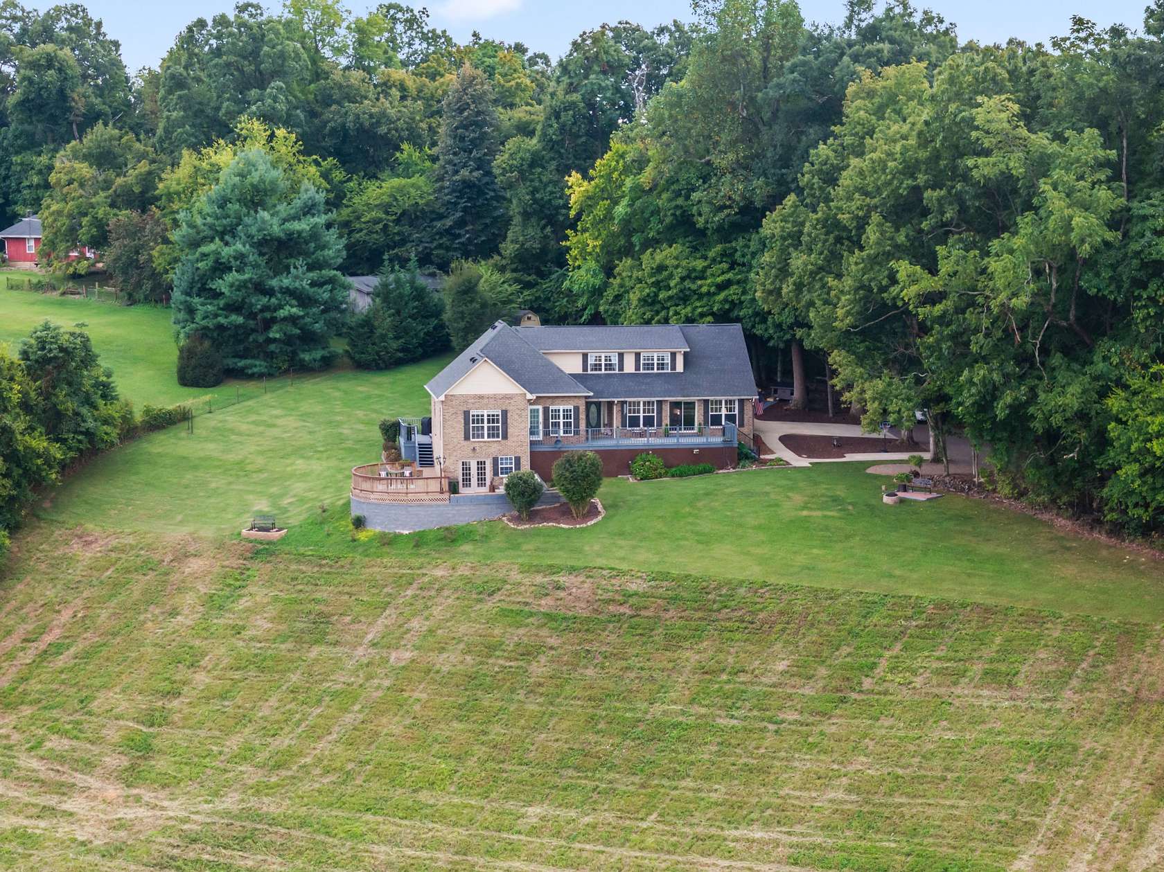 3.85 Acres of Residential Land with Home for Sale in Normandy, Tennessee