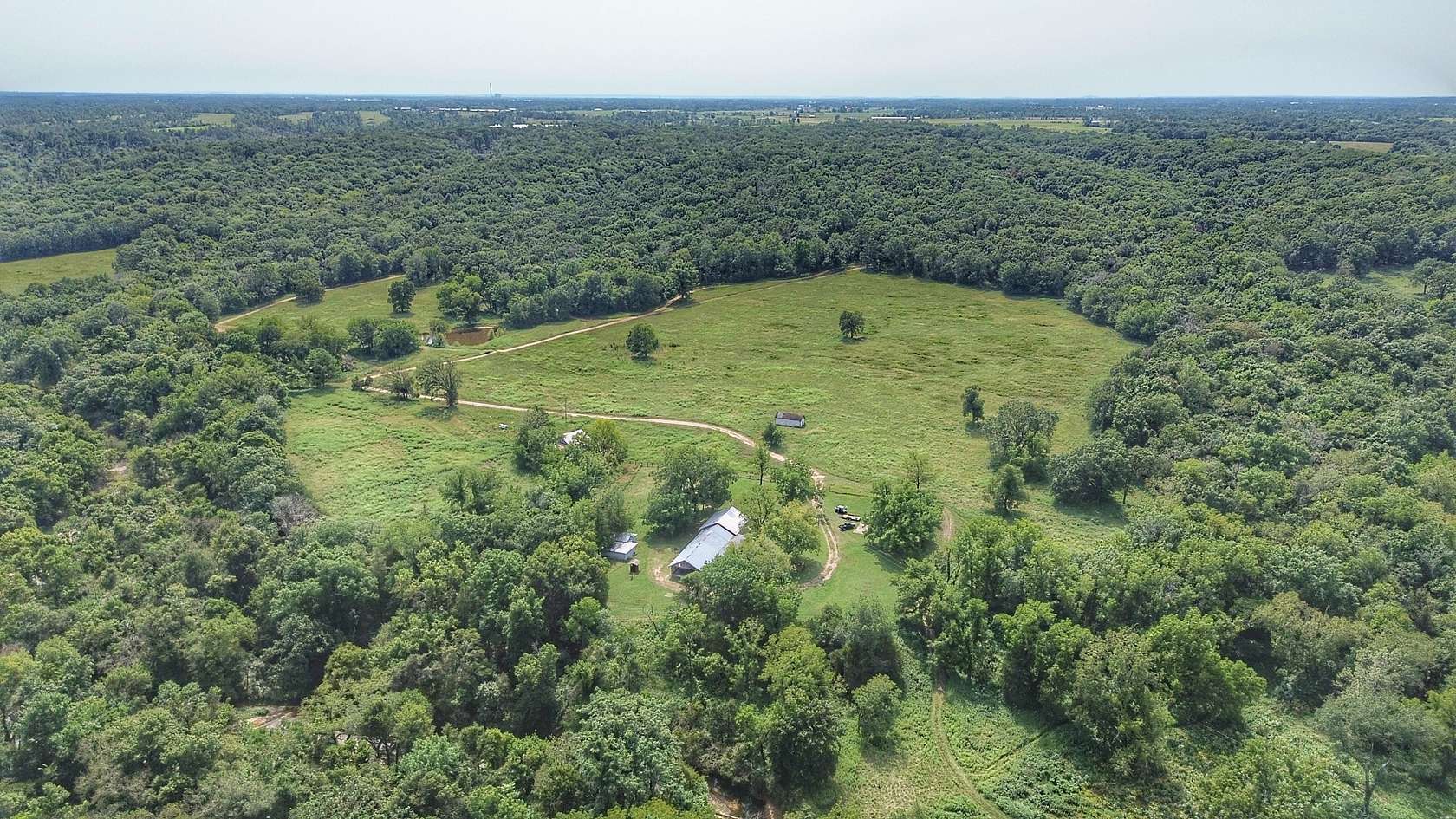380 Acres of Land with Home for Sale in Gentry, Arkansas