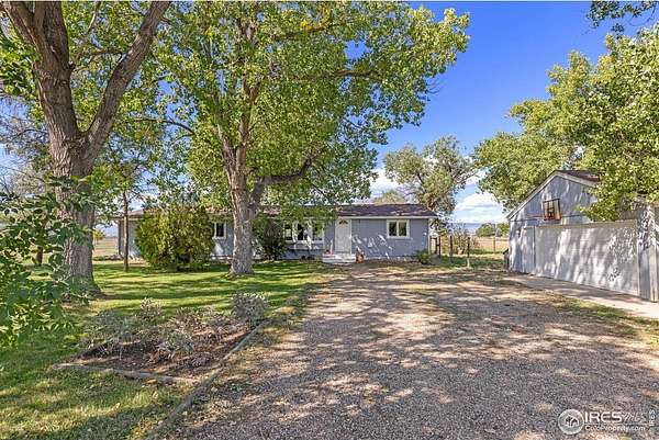 5 Acres of Land with Home for Sale in Loveland, Colorado