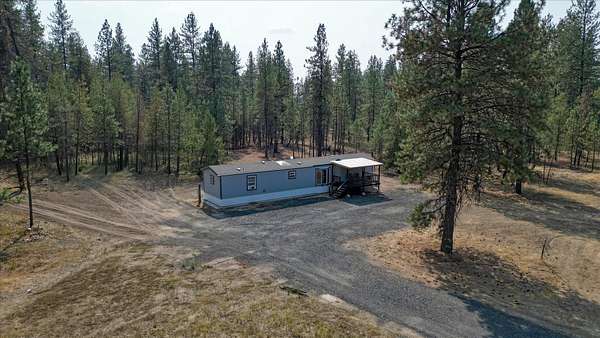 14.9 Acres of Land with Home for Sale in Chattaroy, Washington