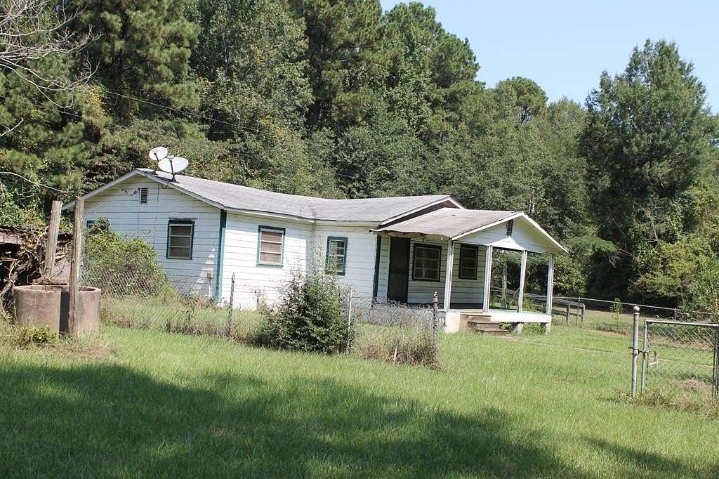 2 Acres of Residential Land with Home for Sale in Milam, Texas