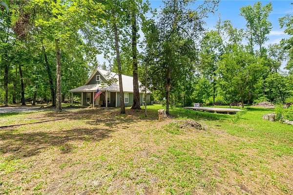 5 Acres of Residential Land with Home for Sale in Fort White, Florida