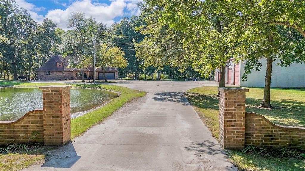 9 Acres of Residential Land with Home for Sale in Harrisonville, Missouri