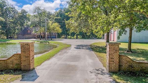 9 Acres of Residential Land with Home for Sale in Harrisonville, Missouri