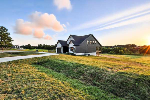 1.6 Acres of Residential Land with Home for Sale in Adams, Tennessee