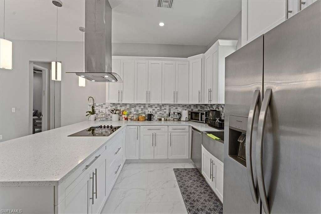 2.73 Acres of Residential Land with Home for Sale in Naples, Florida