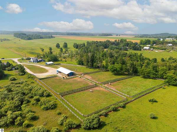 7.63 Acres of Land with Home for Sale in Williamsburg, Michigan