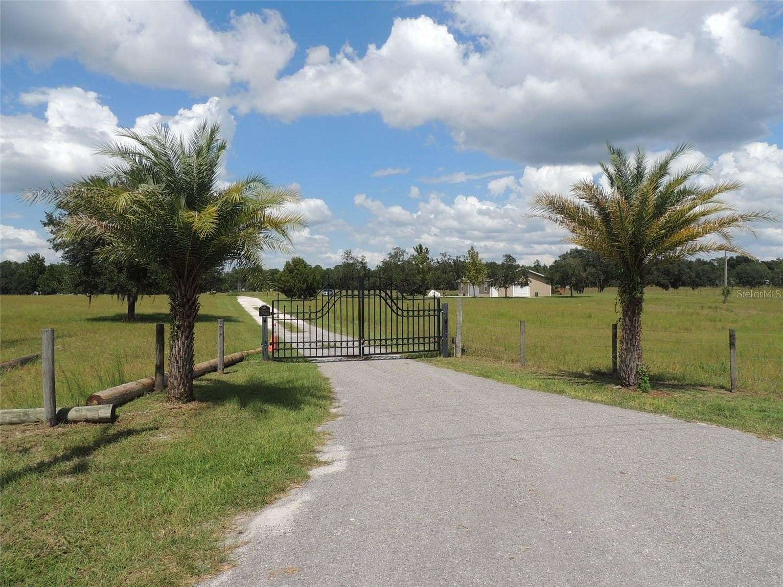 9.73 Acres of Land with Home for Sale in Bronson, Florida