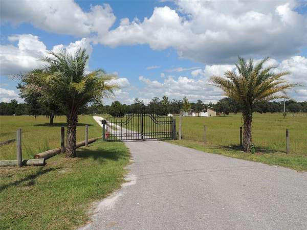 9.73 Acres of Land with Home for Sale in Bronson, Florida