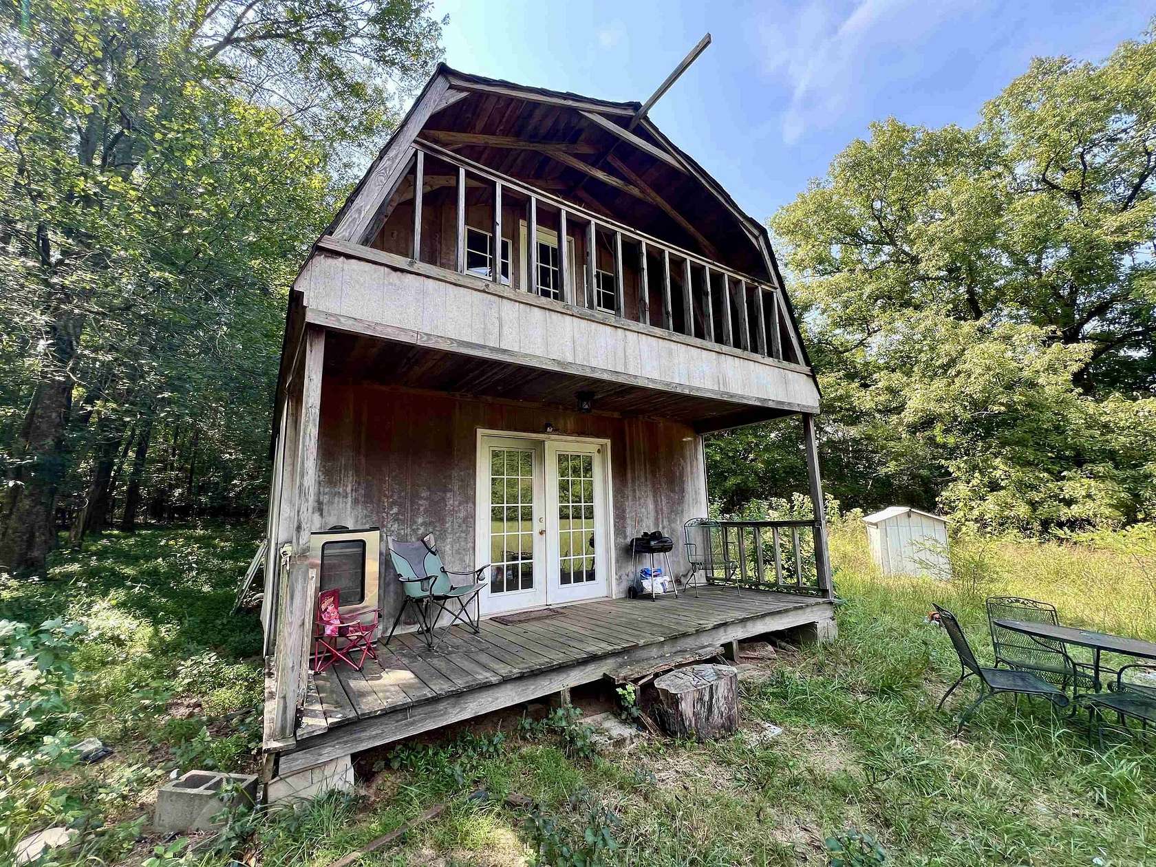 7.76 Acres of Residential Land with Home for Sale in Mena, Arkansas