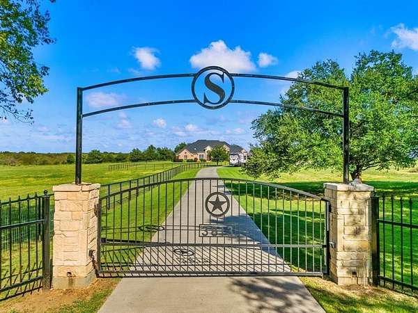 10.4 Acres of Land with Home for Sale in Caddo Mills, Texas