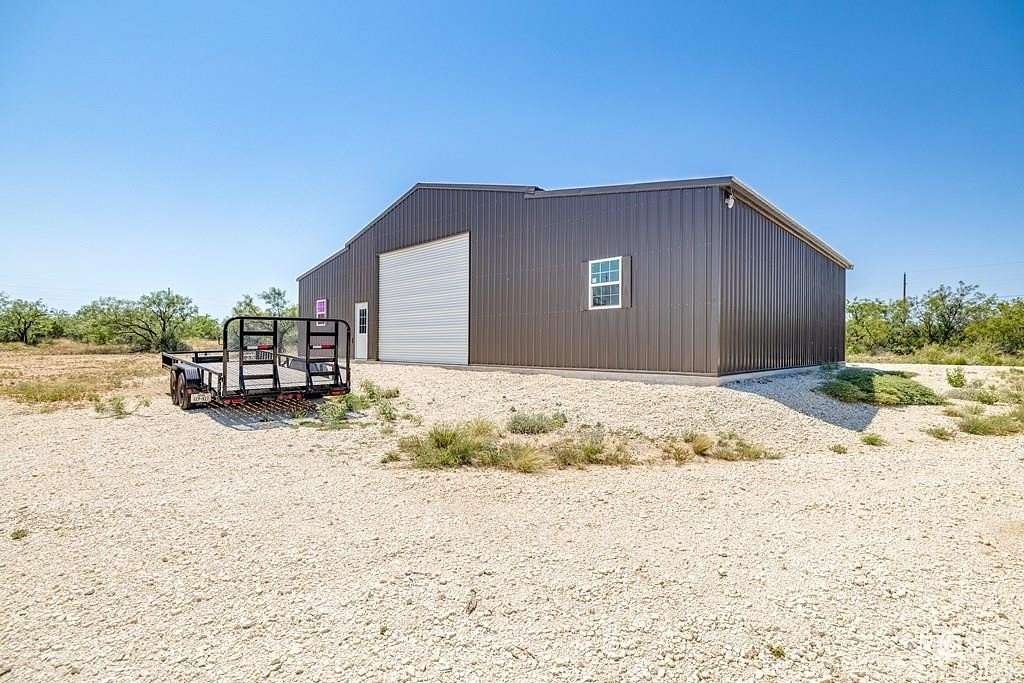 12.2 Acres of Recreational Land with Home for Sale in Millersview, Texas