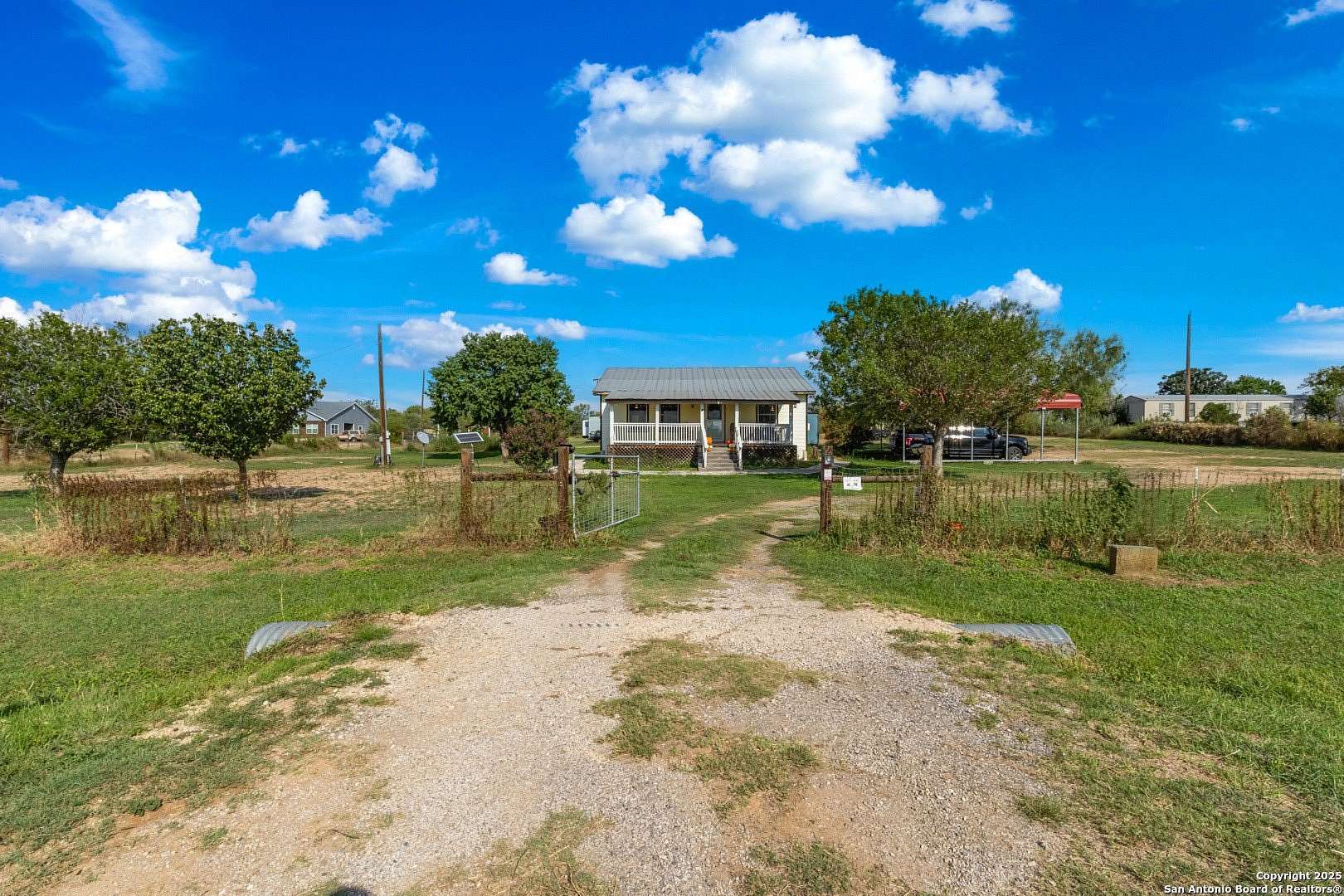 1.62 Acres of Residential Land with Home for Sale in Devine, Texas