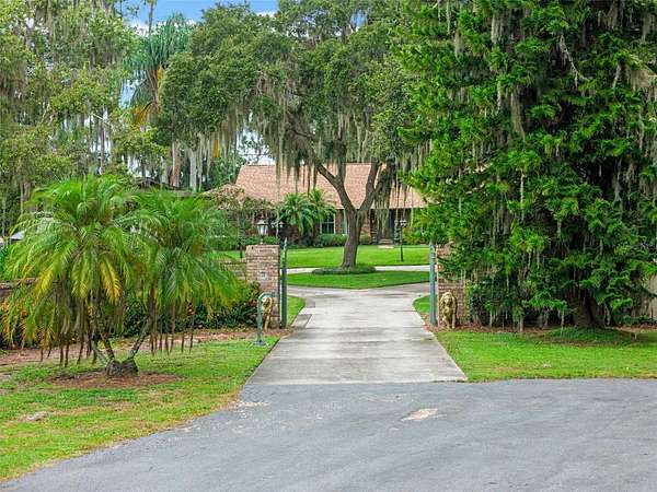 2.3 Acres of Residential Land with Home for Sale in Orlando, Florida