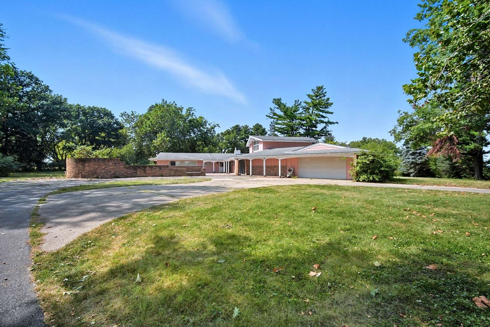 6.35 Acres of Residential Land with Home for Sale in Carlisle, Iowa