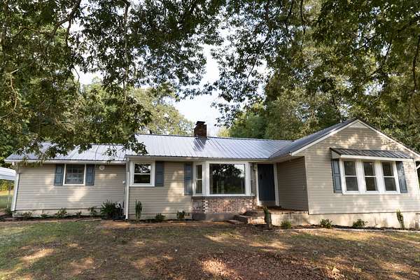 5.22 Acres of Residential Land with Home for Sale in Leoma, Tennessee