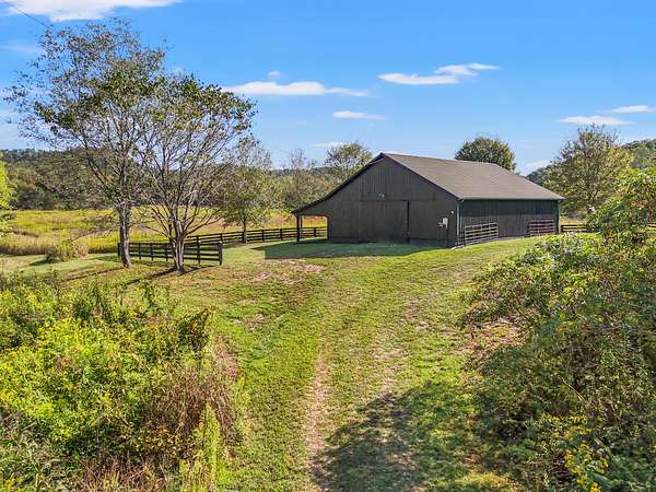 100 Acres of Land with Home for Sale in Liberty, Kentucky