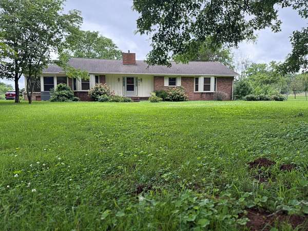 5 Acres of Residential Land with Home for Auction in Lascassas, Tennessee