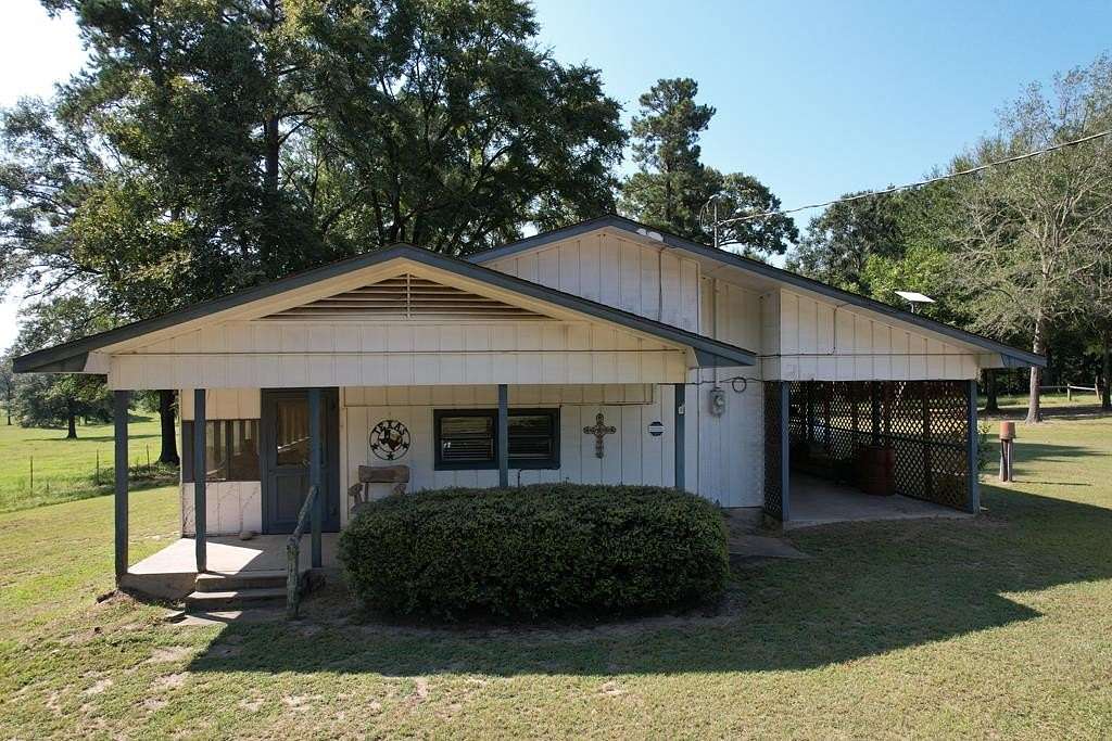 26.2 Acres of Agricultural Land with Home for Sale in Kennard, Texas