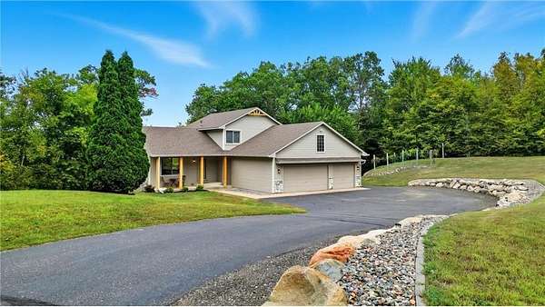 2.74 Acres of Residential Land with Home for Sale in Zimmerman, Minnesota