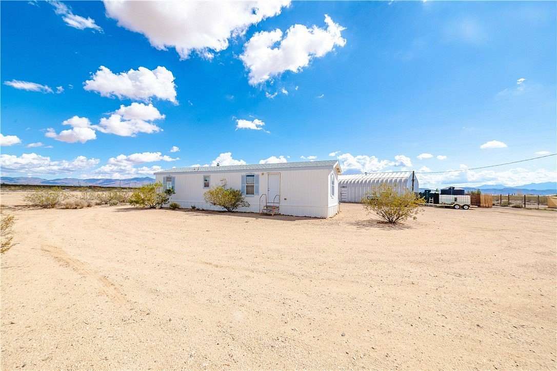 2.35 Acres of Residential Land with Home for Sale in Golden Valley, Arizona