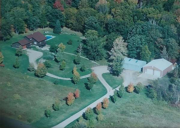 8.47 Acres of Residential Land with Home for Sale in Black Brook Town, Wisconsin