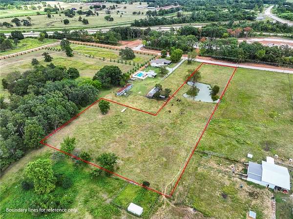 3 Acres of Land for Sale in Gravette, Arkansas