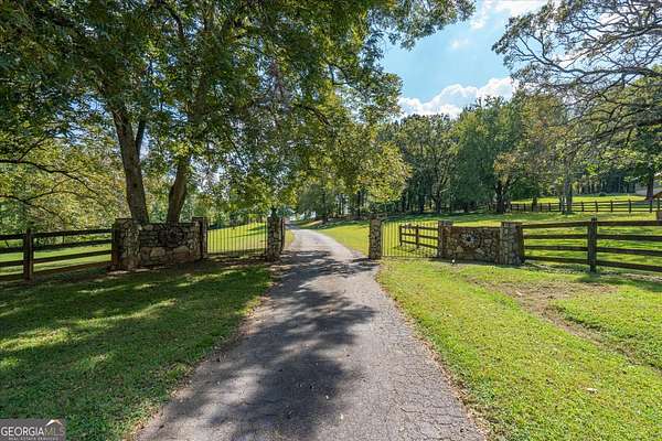 79 Acres of Land with Home for Sale in Waco, Georgia