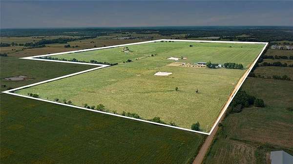 280 Acres of Land with Home for Sale in Gravette, Arkansas