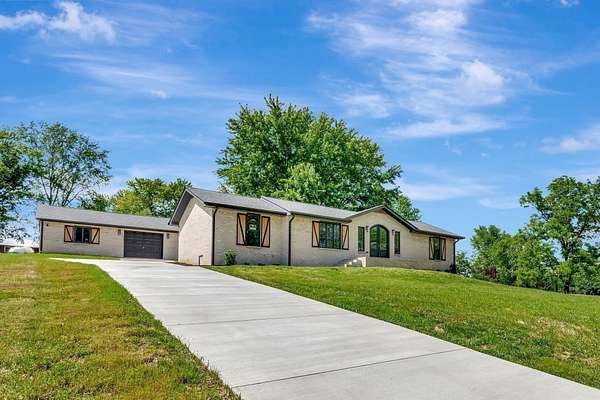 1.8 Acres of Residential Land with Home for Sale in Portland, Tennessee