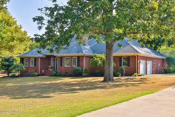 6.32 Acres of Residential Land with Home for Sale in Sharon, Tennessee