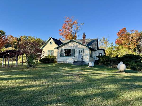 12.9 Acres of Land with Home for Sale in Luzerne, Michigan