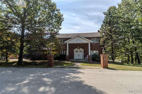 7.65 Acres of Residential Land with Home for Sale in St. Robert, Missouri