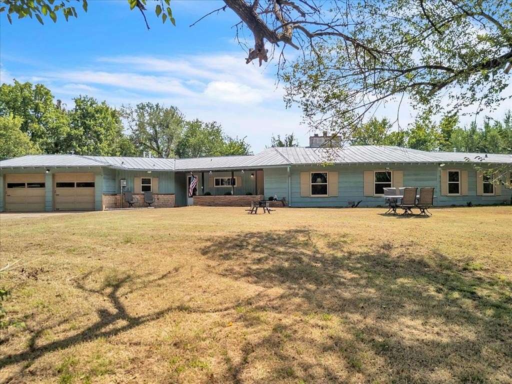 5.6 Acres of Residential Land with Home for Sale in Guthrie, Oklahoma