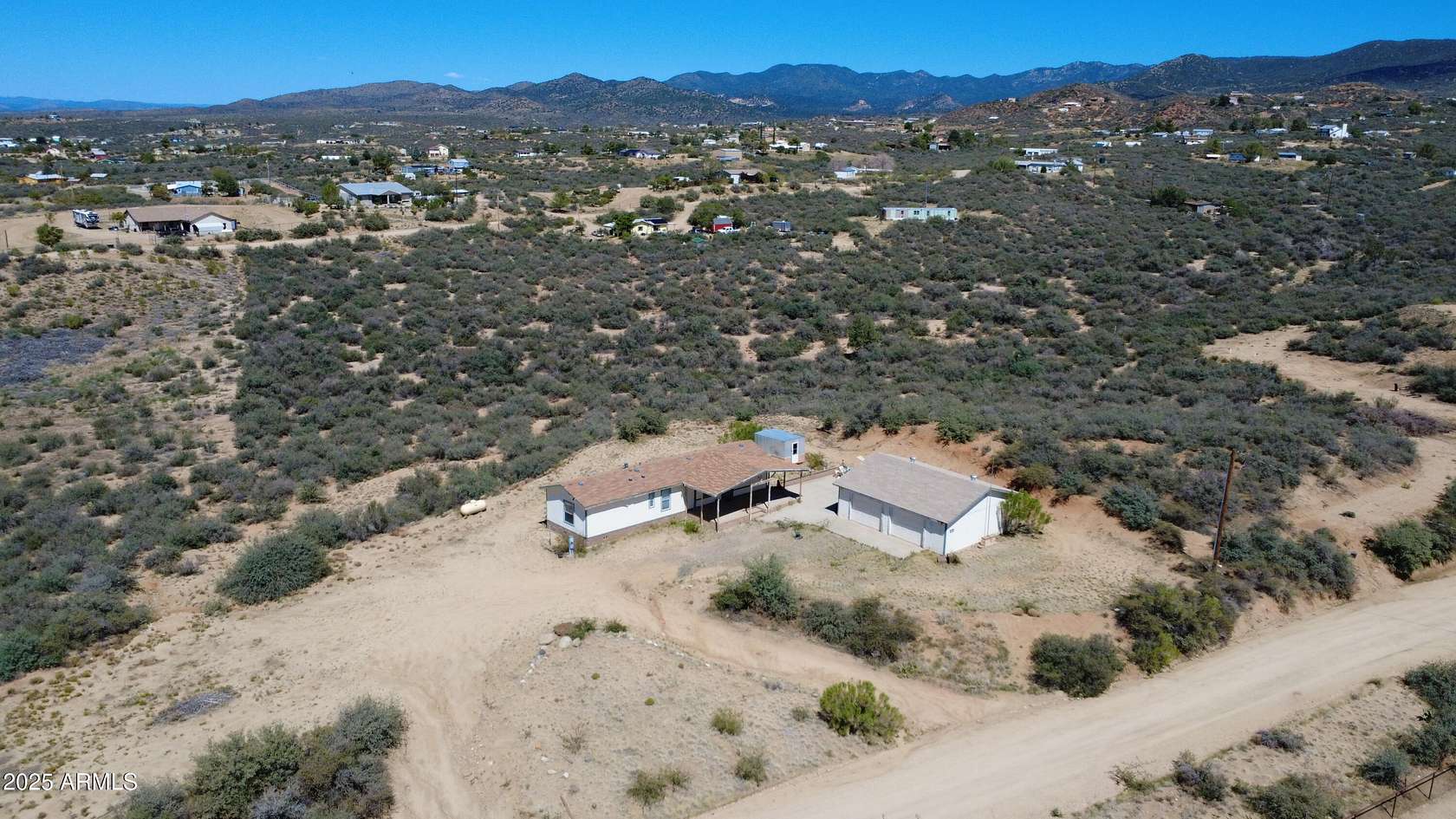 2.5 Acres of Residential Land with Home for Sale in Kirkland, Arizona