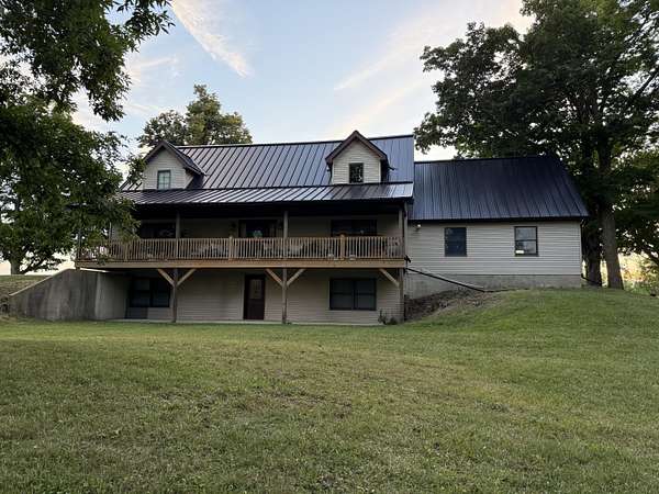 5 Acres of Residential Land with Home for Sale in Osseo, Michigan